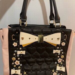 Betsey Johnson Black and Pink Tote with Bow and Floral Accents.